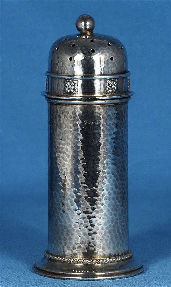 A George V Arts & Crafts silver sugar caster, by Albert Edward Jones, Height 168mm Weight: 5.7oz/180grms